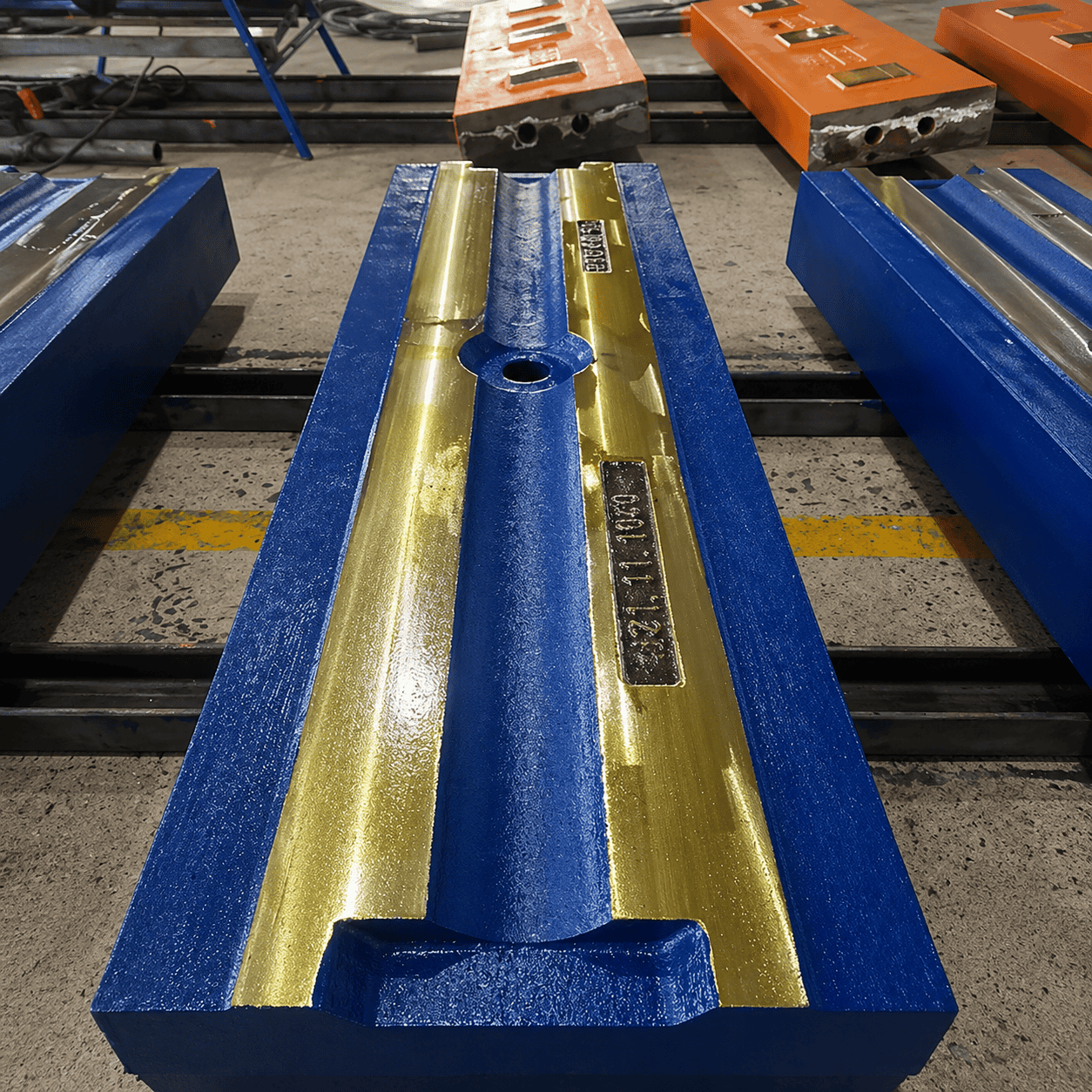 Crusher blow bar wear part for impact crusher replacement applications.