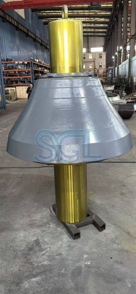Large machined crusher component with durable metallic finish.