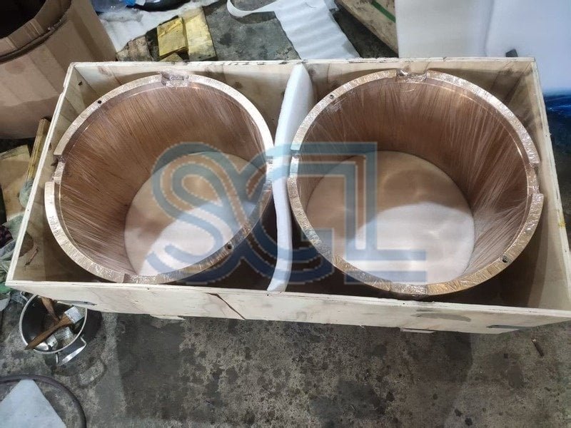 Crusher wear parts packed in wooden crates for export delivery.
